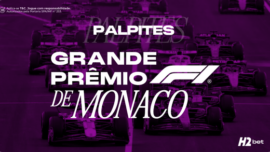 Banner promocional de palpites esportivos da H2bet para a Fórmula 1. No centro da imagem, destaca-se o título "PALPITES GRANDE PRÊMIO DE MONACO" integrado ao logotipo oficial da F1. O cenário de fundo exibe carros de corrida em ação na pista sob um filtro de cor roxa. No canto inferior direito, encontra-se o logotipo da H2bet, acompanhado por selos de jogo responsável e licenciamento no canto superior esquerdo. Arte focada em prognósticos e apostas em automobilismo.